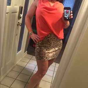 Lush snake print and orange mini dress.